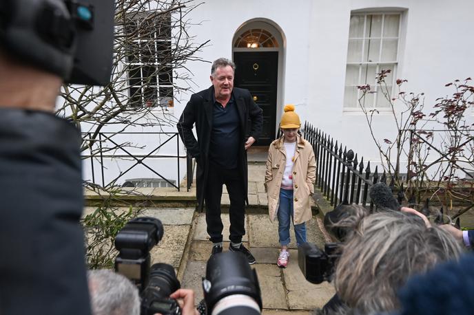Piers Morgan | Piersa Morgana so dan po odpovedi okupirali novinarji. Na fotografiji je s hčerko Elise, ki jo je ravno hotel pospremiti v šolo. | Foto Reuters