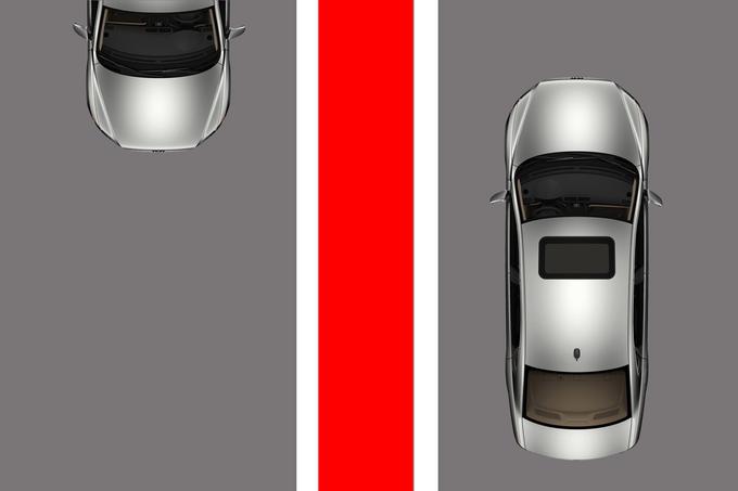 Grafika je zgolj simbolična. Prikazuje dva prometna pasova, ki ju ločuje dvojna neprekinjena s širokim rdečim pasom v sredini. | Foto: 