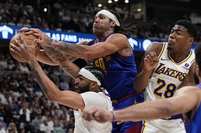 Denver Nuggets |  Branilci naslova Denver Nuggets so na prvi tekmi končnice v ligi NBA s 114:103 premagali Los Angeles Lakers in zabeležili deveto medsebojno zmago v nizu. | Foto Guliverimage