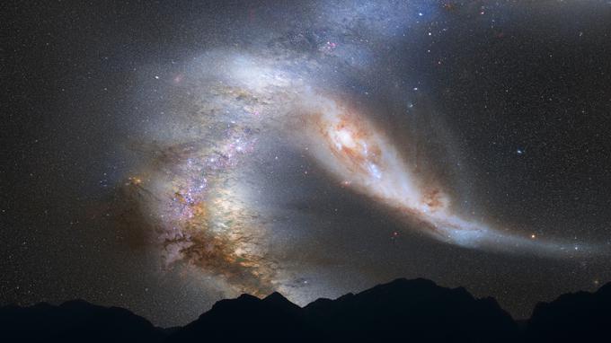 ... se bosta naša galaksija Rimska cesta in Andromeda, najbližja velika galaksija, združili v eno. Znanstveniki so jo že danes poimenovali Milkomeda.  | Foto: Reuters