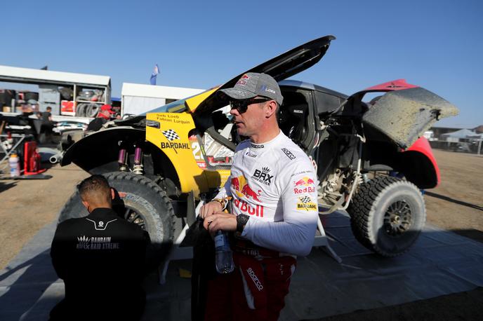 Sebastien Loeb | Sebastien Loeb je v konkurenci avtomobilistov dočakal prvi zmago na letošnjem Dakarju. | Foto Reuters