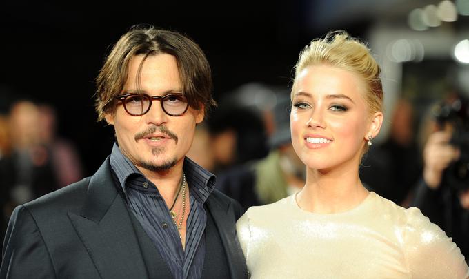 Igralca Johnny Depp in Amber Heard sta se poročila leta 2015, a sta zvezo končala že po 15 mesecih. | Foto: Reuters