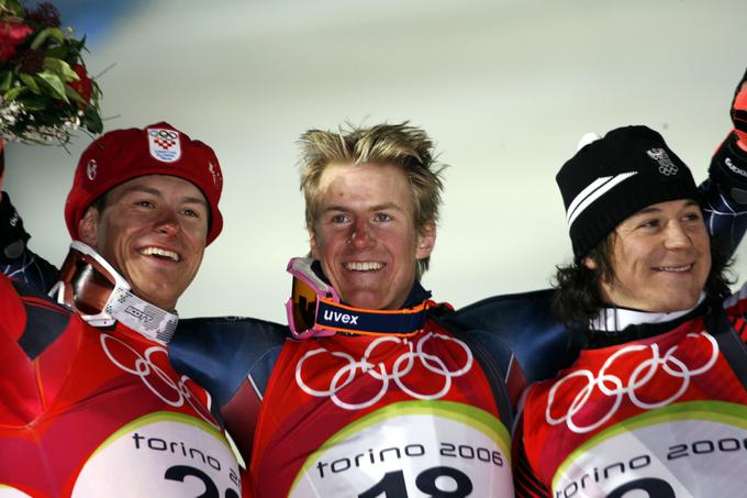 Leta 2006 je postal olimpijski prvak v kombinaciji. Na stopničkah sta mu družbo delala Ivica Kostelić in Rainer Schönfelder. | Foto: AP / Guliverimage