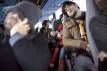 migranti na avtobusu