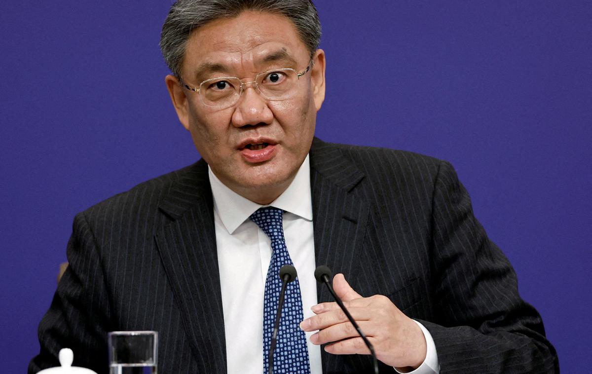 Wang Wentao | Wang Wentao, kitajski trgovinski minister, prihaja na srečanje s francosko vlado.  | Foto Reuters