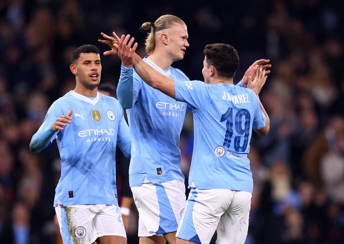Manchester City je na povratni tekmi osmine finala lige prvakov zmagal s 3:1 in zanesljivo napredoval med najboljših osem. Za branilce naslova so v polno zadeli Manuel Akanji, Julian Alvarez in Erling Haaland. | Foto: Reuters