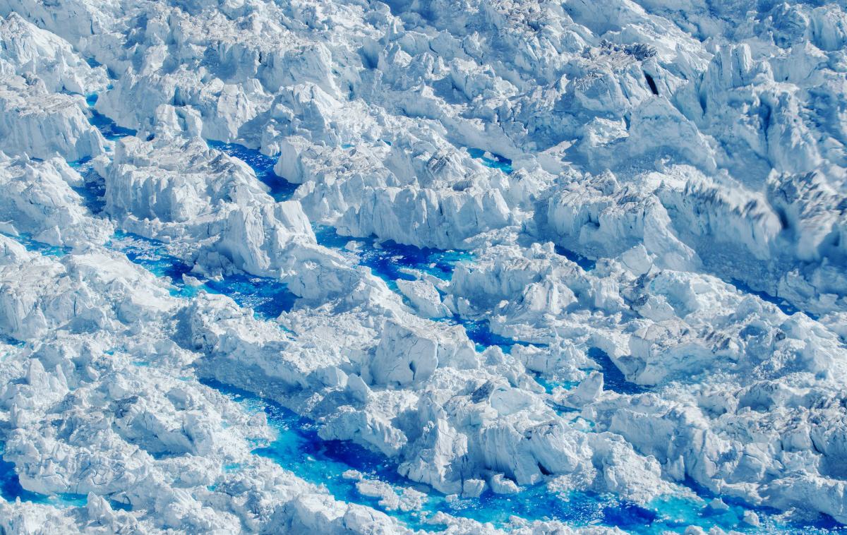 Grenlandija | Otok, ki je širok zgolj 30 metrov in visok tri metre, se je pokazal, ko se je premaknil ledenik (fotografija je simbolična). | Foto Reuters