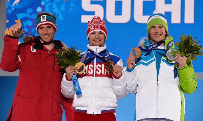 Ameriški Rus Vic Wild je na olimpijskih igrah v Sočiju osvojil dve zlati olimpijski medalji. Družbo na zmagovalnem odru mu je delal Žan Košir, ki je v Sočiju osvojil bron in srebro. | Foto: Getty Images